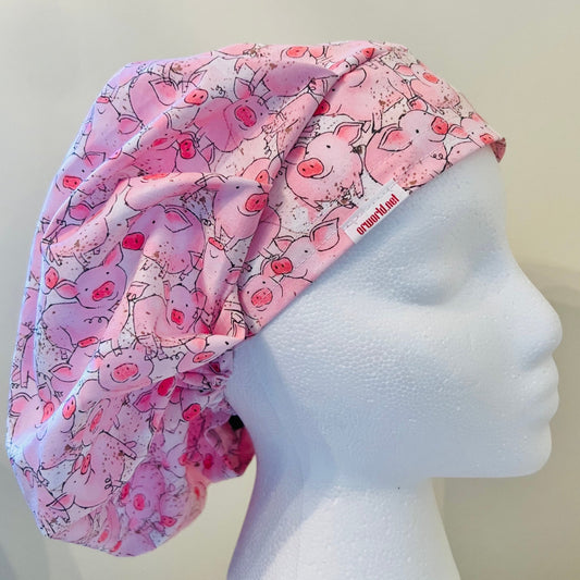 Bouffant surgical scrub hat with pink pigs